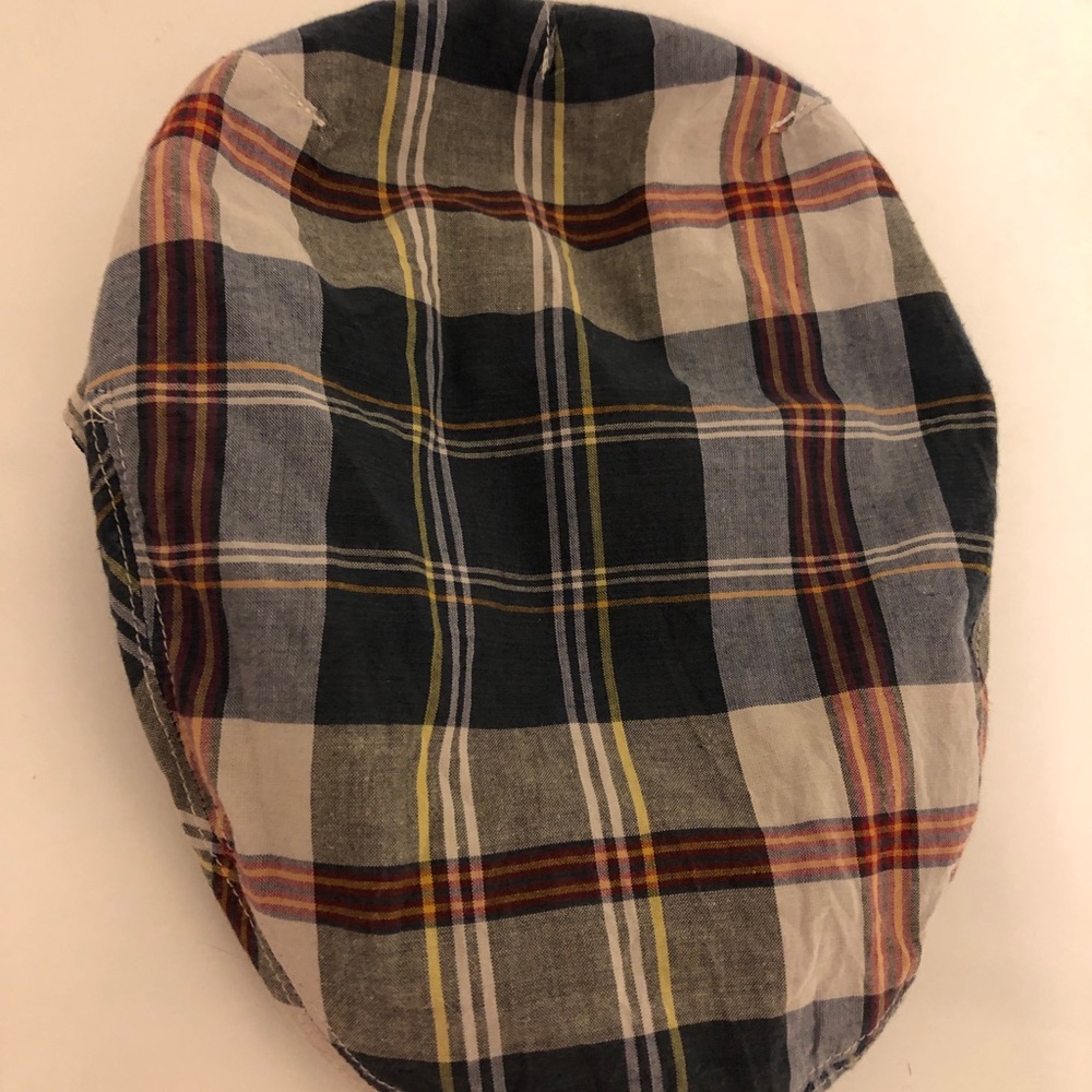 Blue plaid newsboy cap.